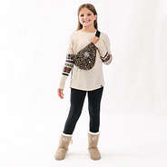 kids monogrammed sling pack in cheetah on girl with long sleeve shirt