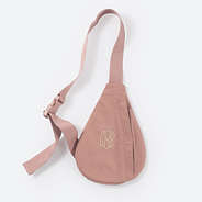 monogrammed kids sling pack in blush