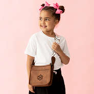 white leopard kids saddlebag over the shoulder