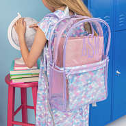 close up of girl carrying personalized clear mermaid magic backpack