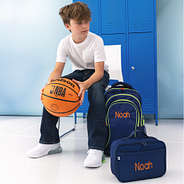 boy with monogrammed navy backpack and lunch box