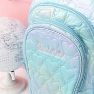 blue quilted hearts backpack detail monogram shot