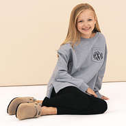 girl wearing heathered grey personalized crewneck sweatshirt with leggings