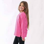 youth girl wearing hot pink sweatshirt