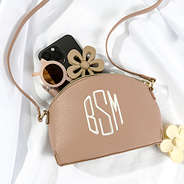 spill shot with tan youth crossbody purse