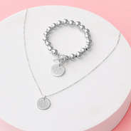 silver kids disc necklace with ball bracelet