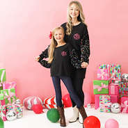 mom and me sequin sweatshirts on addie and brittany