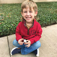 boy wearing red plaid monogrammed quarter zip sweatshirt