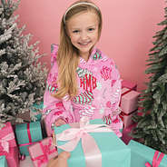 girl with present in blanket hoodie in fun and frosted