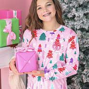 close up of kids monogrammed nightgown in christmas pink wonderland