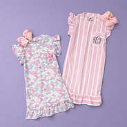 mermaid and pink and white nightgowns flatlay