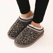 girl wearing leopard print moccasins