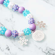 girls snowflake necklace up close