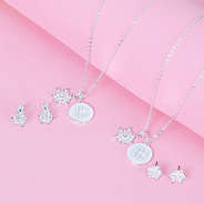 clip on and pierced silver snowflake earrings and necklace