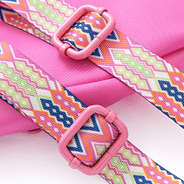 close up of hot pink kids sling backpack straps
