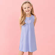 girl wearing kids scallop monogrammed lavender dress