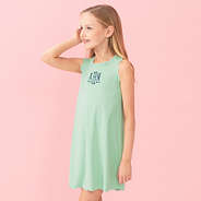girl wearing personalized mint scallop dress