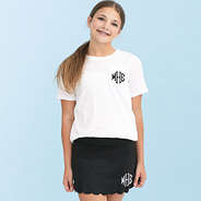 girl wearing black kids monogrammed skort