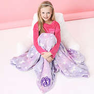 unicorn pink and purple monogrammed blanket over girl