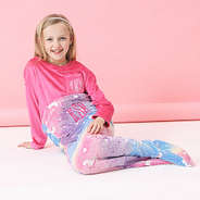 girl wearing personalized mermaid tail blanket