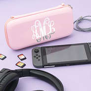 monogrammed pink game travel case with games and cord