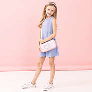 girl with monogrammed nintendo switch gaming travel case over shoulder