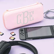 monogrammed pink game travel case with games and cord