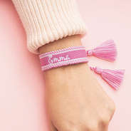 monogrammed woven bracelet in pink on girls wrist