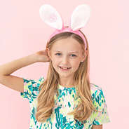close up of girls wearing monogrammed bunny ears