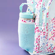 wild confetti tumble in monogrammed backpack side pocket