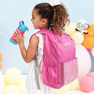 girl drinking from monogrammed hot pink and mint flip straw water bottle