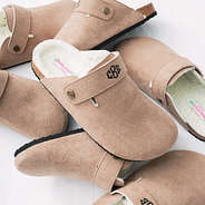 close up of monogrammed kids clogs