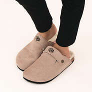 kid wearing monogrammed clogs