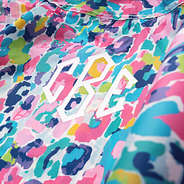 close up of monogrammed watercolor cheetah rain poncho