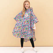 girl wearing watercolor cheetah kids monogrammed rain poncho