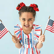 close up of americana monogrammed ruffle knit dress