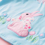 close up of embroidered bunny leggings set