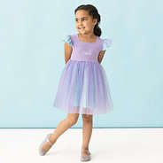 girl wearing purple and blue monogrammed twirl dress