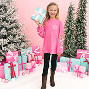 christmas sweatshirt in hotpink on girl holding a present