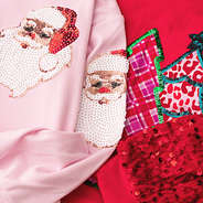 duo christmas sweatshirts up close
