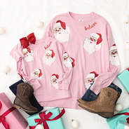 light pink christmas sweatshirt mom and me flatlay