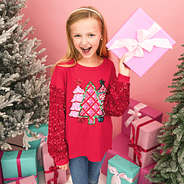 red christmas sweatshirt on Addie