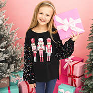 black nutcracker sweatshirt on addie