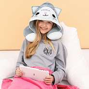 girl wearing personalized kitty hooded travel pillow