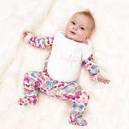 pink outline baby bib on baby