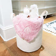 pink kids bow blanket in basket