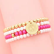 girls pink beaded bracelet stack