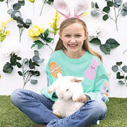 girl wearing monogrammed kids easter sweatshirt with bunny