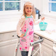 girl wearing kids monogrammed fun and frosted apron