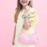 pink girls shoulder bag on arm